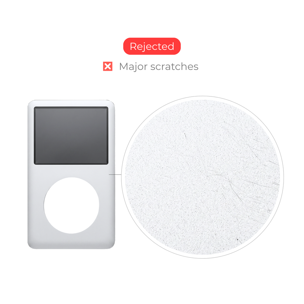 A silver iPod-style player shown on a white background with a circular inset highlighting surface scratches, plus text reading 'Rejected' and 'Major scratches' above.