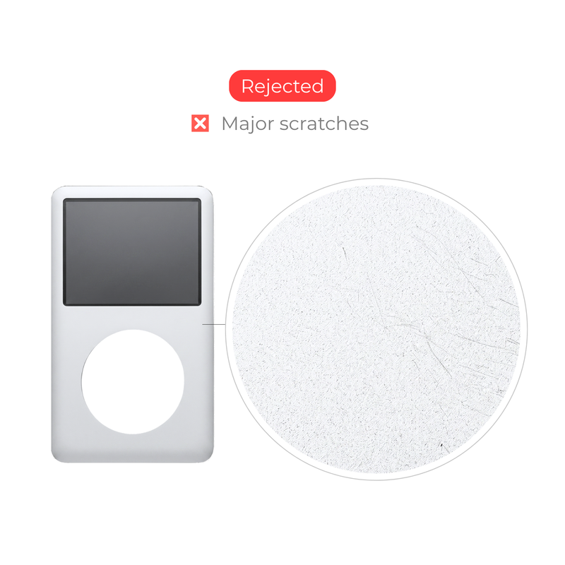 A silver iPod-style player shown on a white background with a circular inset highlighting surface scratches, plus text reading 'Rejected' and 'Major scratches' above.
